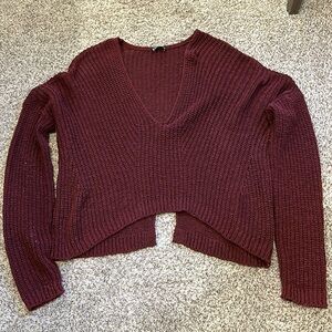 Burgundy drop shoulder, v-neck, split back sweater. Size medium.